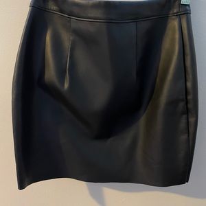 Faux mini-black leather tulip skirt